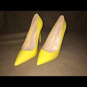 Yellow high heels